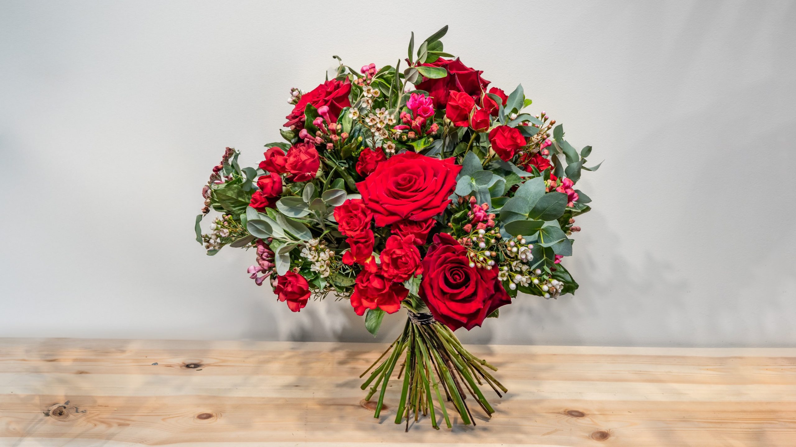 Red rose bouquet with spray roses and greenery – same-day London delivery