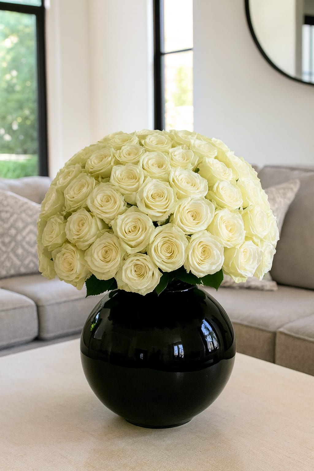 50 white roses arrangement in black vase – Bernard Rochet London