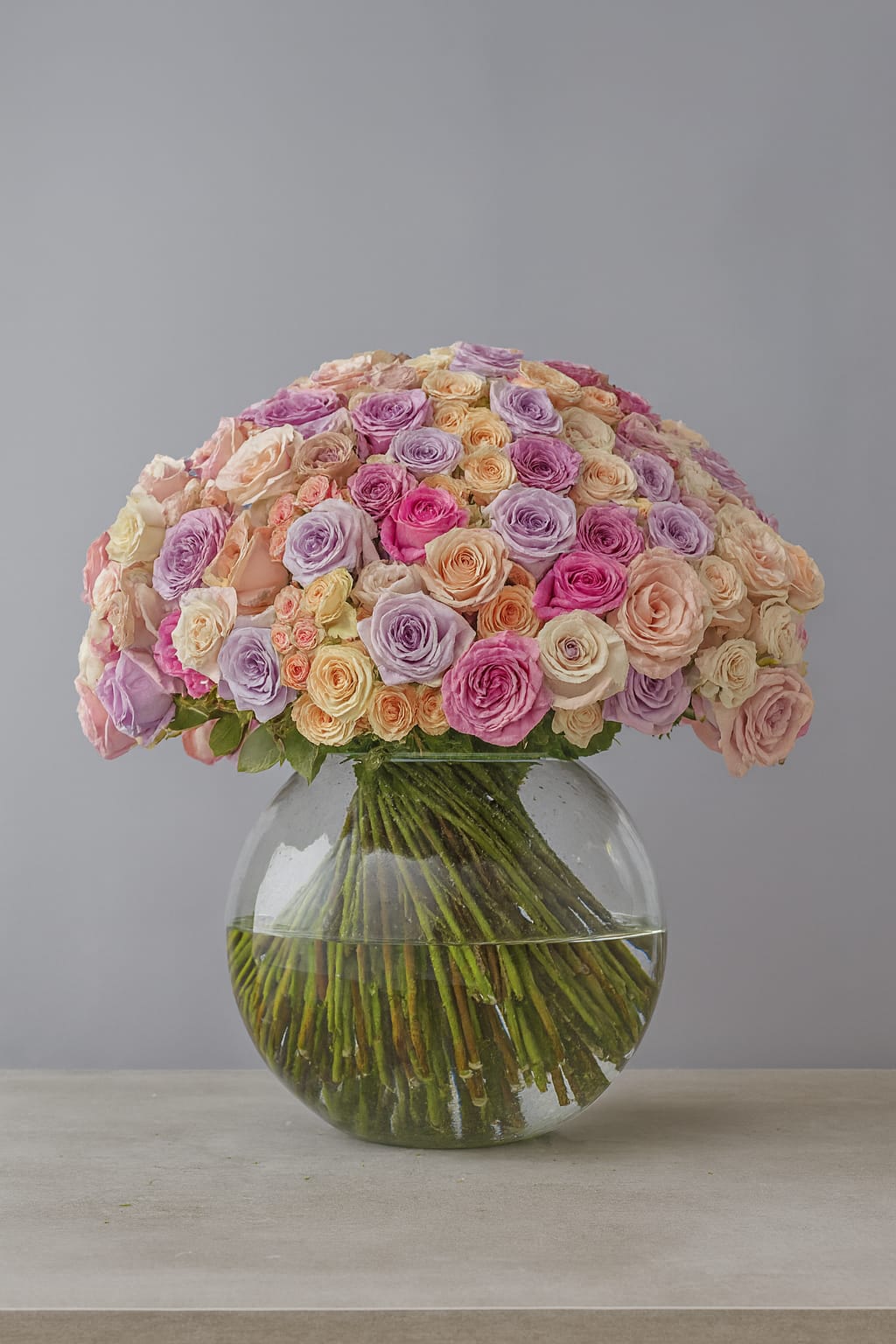Pastel Majesty 160 pastel roses in glass vase, luxury bouquet London